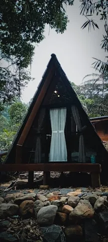 Dark A-frame cabin