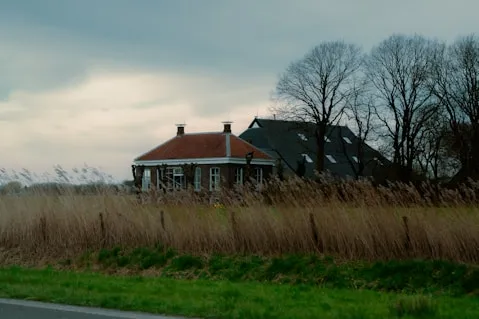 Red house in greenery